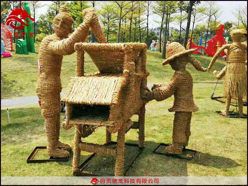 農民豐收節四川農具風穀車稻草人物